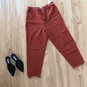 AMAZING terra-cotta red pants w/ white stitching